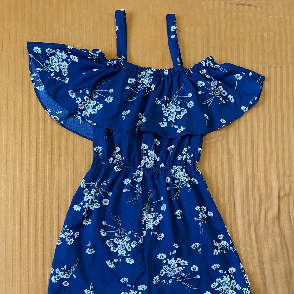 Floral romper with cold shoulder. Great condition.